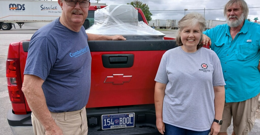 Manchester Tank Environmental Manager Angela Lewis and Warehouse Manager Bert Wyatt helped facilitate propane tank donations to Tennessee communities without power.