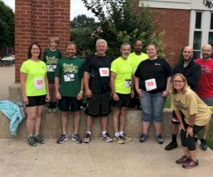 Pictured from L-R: Joyce Klingele, Dustin Schultz and son Liam, Mark Speckhart, Bill Robb, Richard Lorasch, Molly Kindhart, Chris Brueck, Will Merida, Gary Nall and Mike Holman (not pictured)